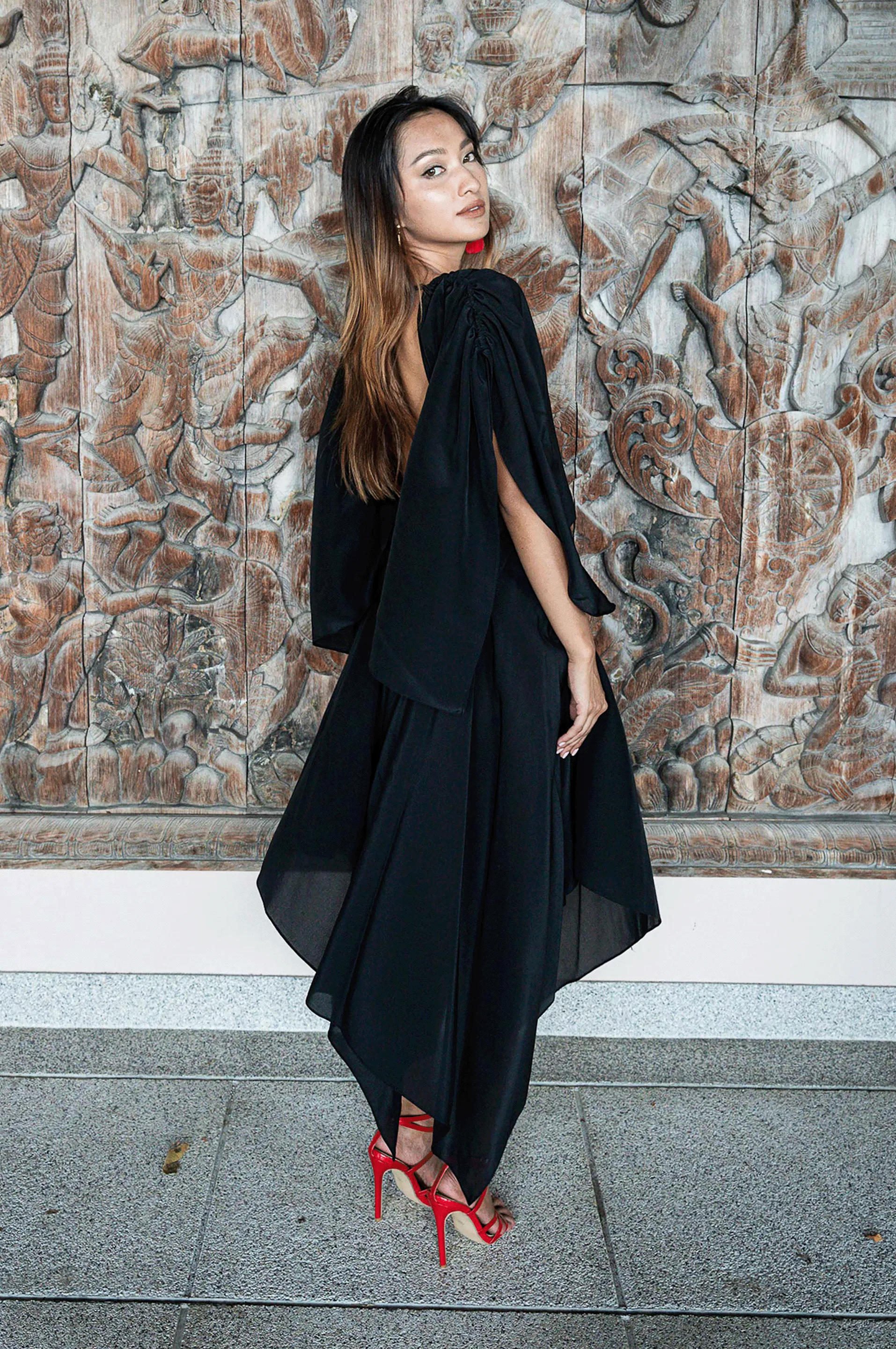 Allure, The Curious Black Wrap Dress