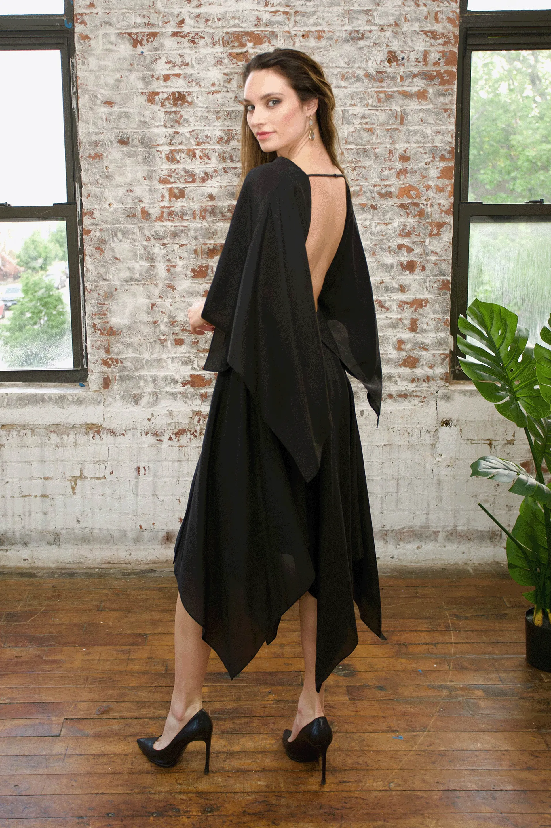 Allure, The Curious Black Wrap Dress