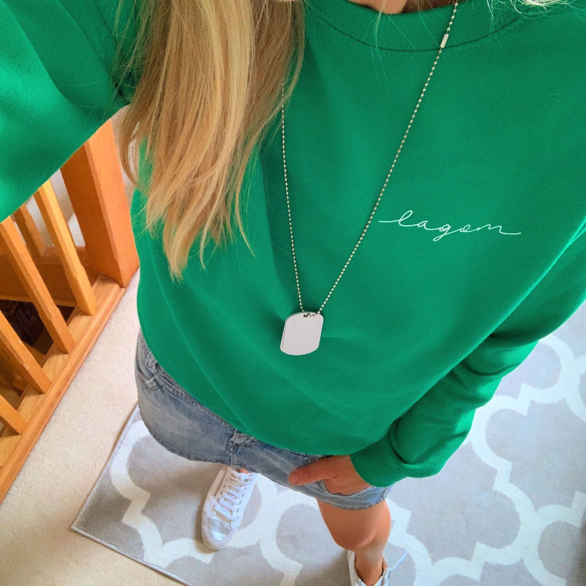 LAGOM on bright green sweatshirt