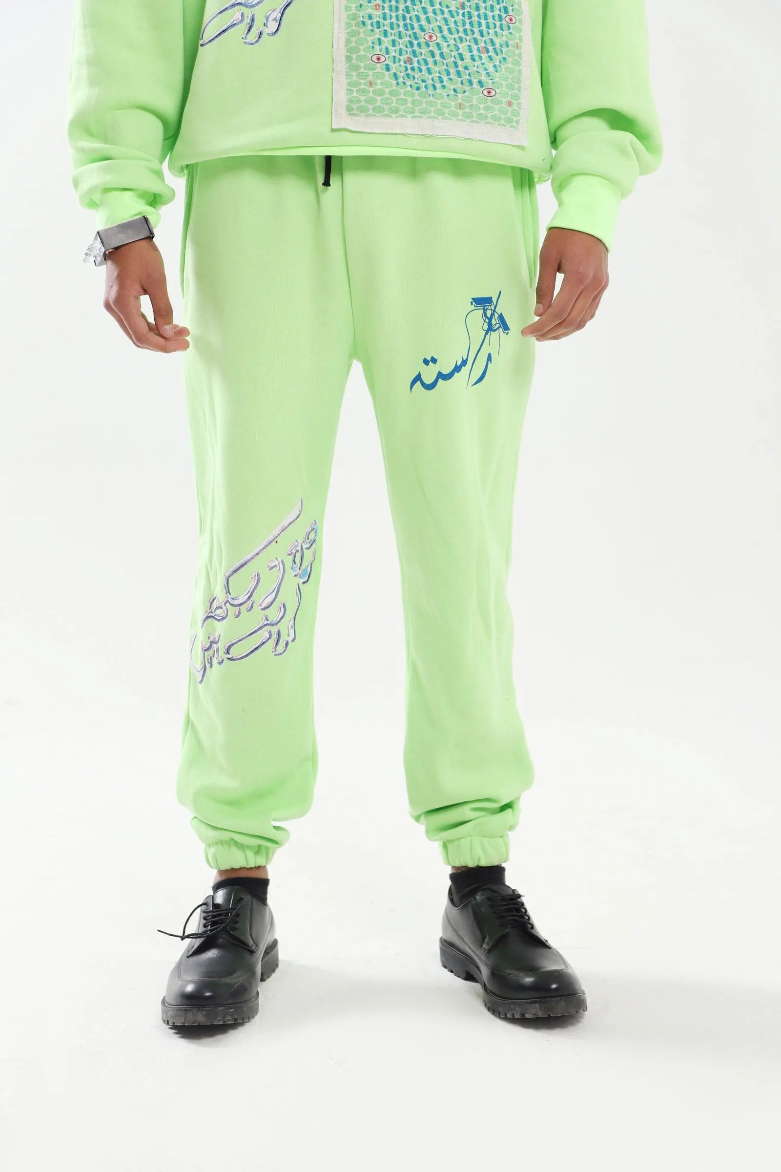 "THE WATCHMAN" NEON GREEN SWEATPANTS