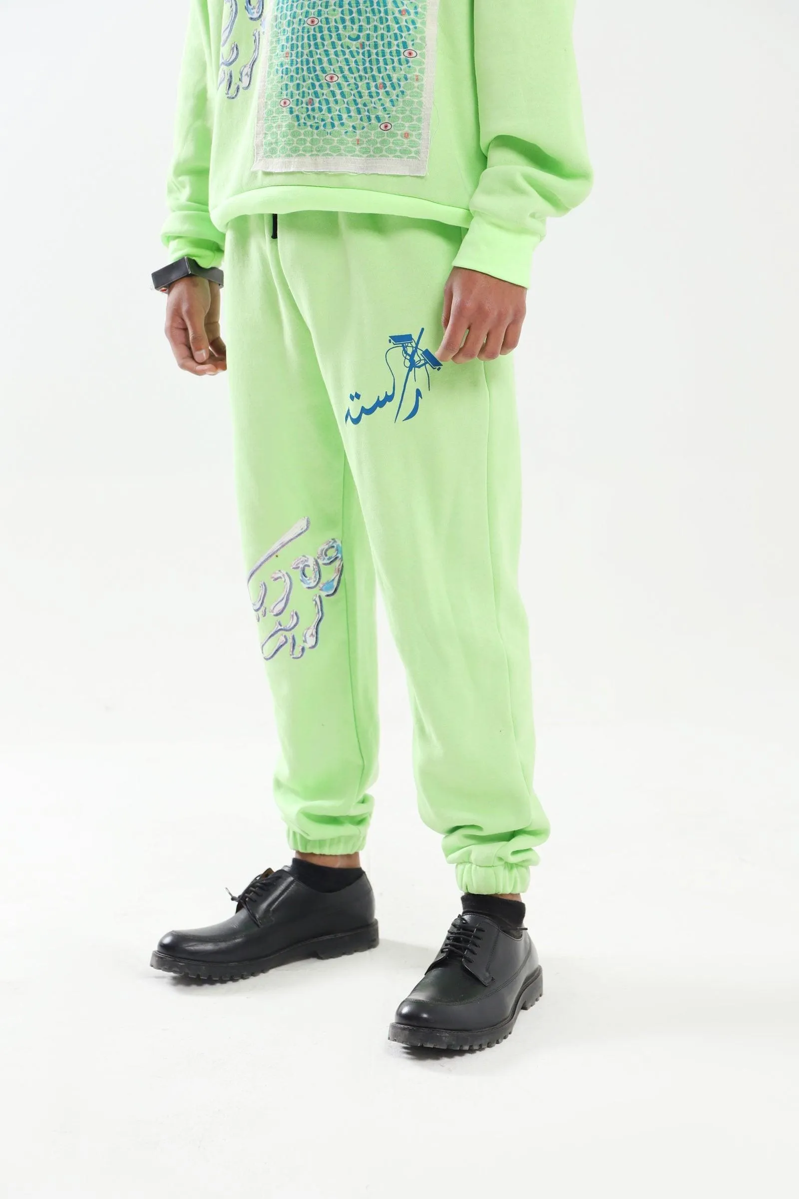 "THE WATCHMAN" NEON GREEN SWEATPANTS